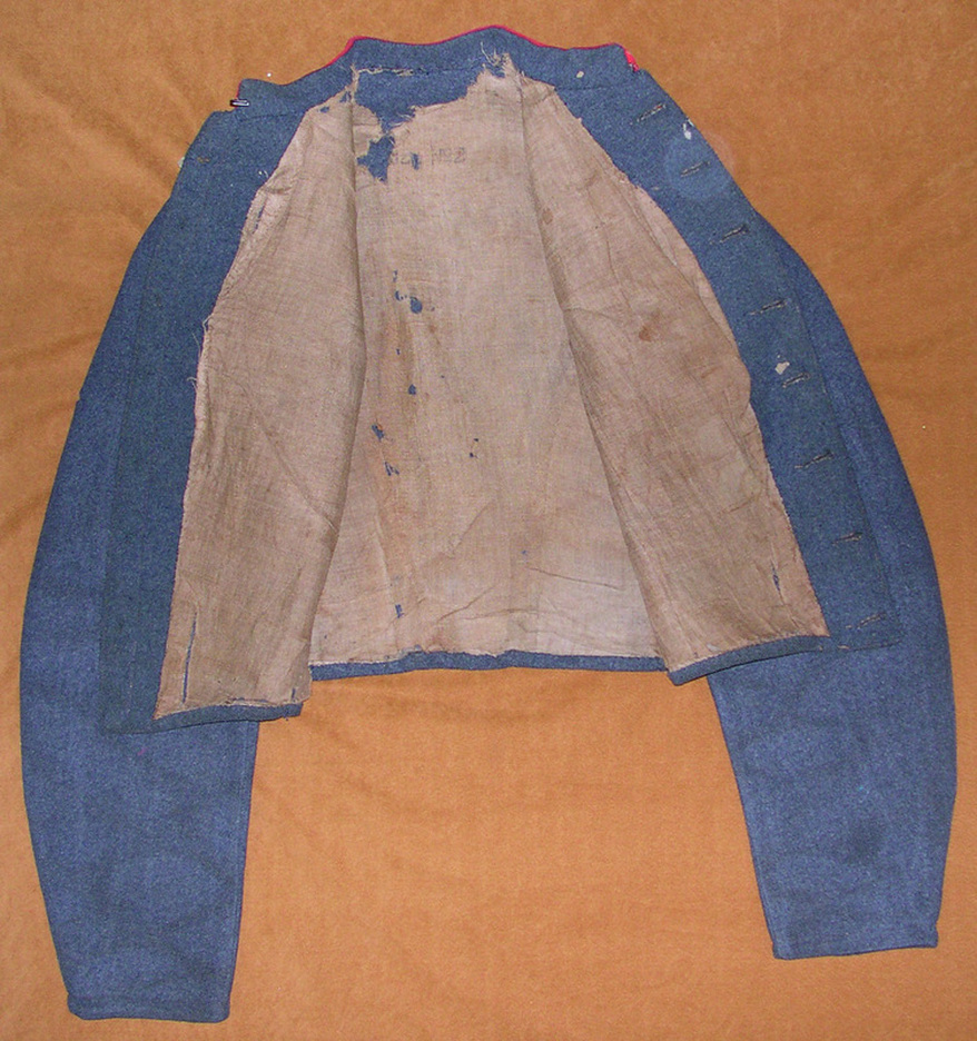 FIG 6: The inside lining is unbleached linen, has a single pocket in the left lapel, and bears a size stamp.  Images courtesy of History Colorado, Francis Marion Durham Collection, Photo. #2005.52.3.v3.