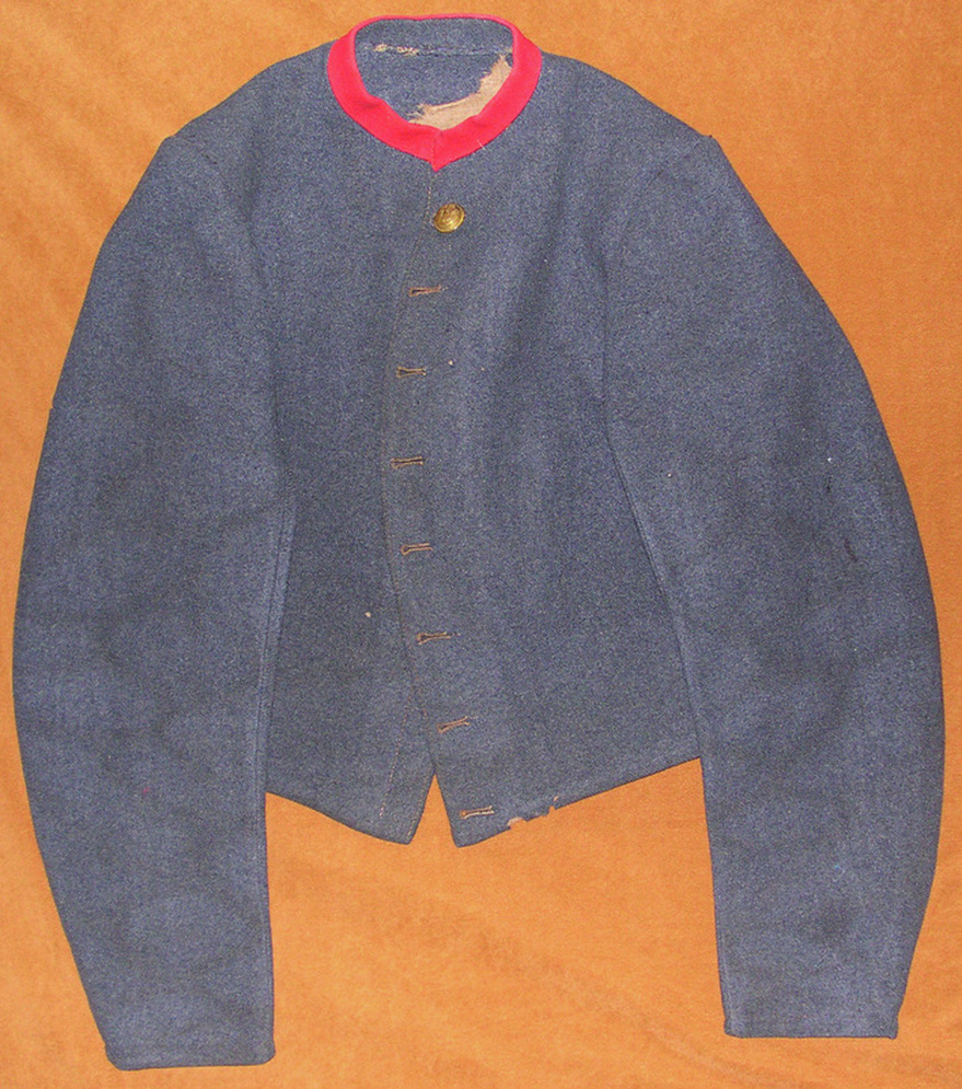 FIG 4: The front of the Durham jacket exhibits eight, keyhole buttons and the blue-gray kersey typical of all Tait jackets.  Images courtesy of History Colorado, Francis Marion Durham Collection, Photo. #2005.52.3.v1.