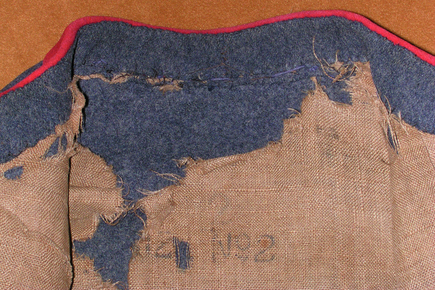FIG 8: The size stamp is partially obliterated, but enough remains to decipher “SIZE No2”.  Images courtesy of History Colorado, Francis Marion Durham Collection, Photo. #2005.52.3.v5. 
